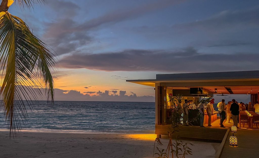 ocean front bar with sunset view