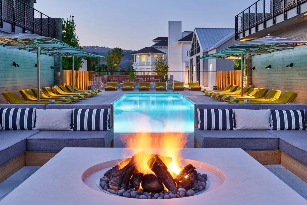 fire pit next to pool