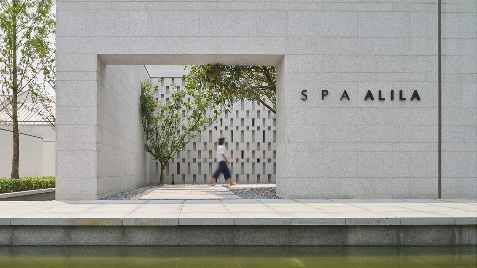 person walking in the spa entrance