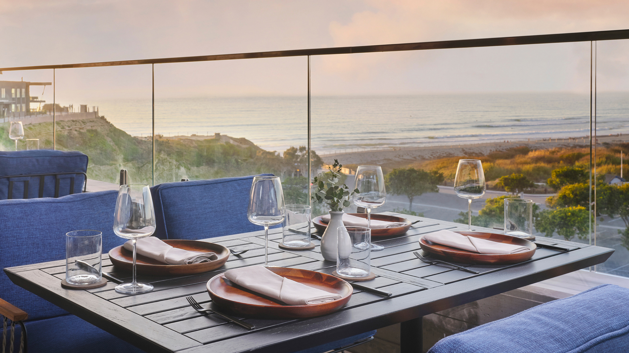 Table on vaga terrace looking out onto the ocean