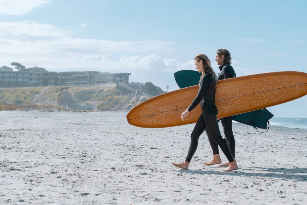 couple going surfing