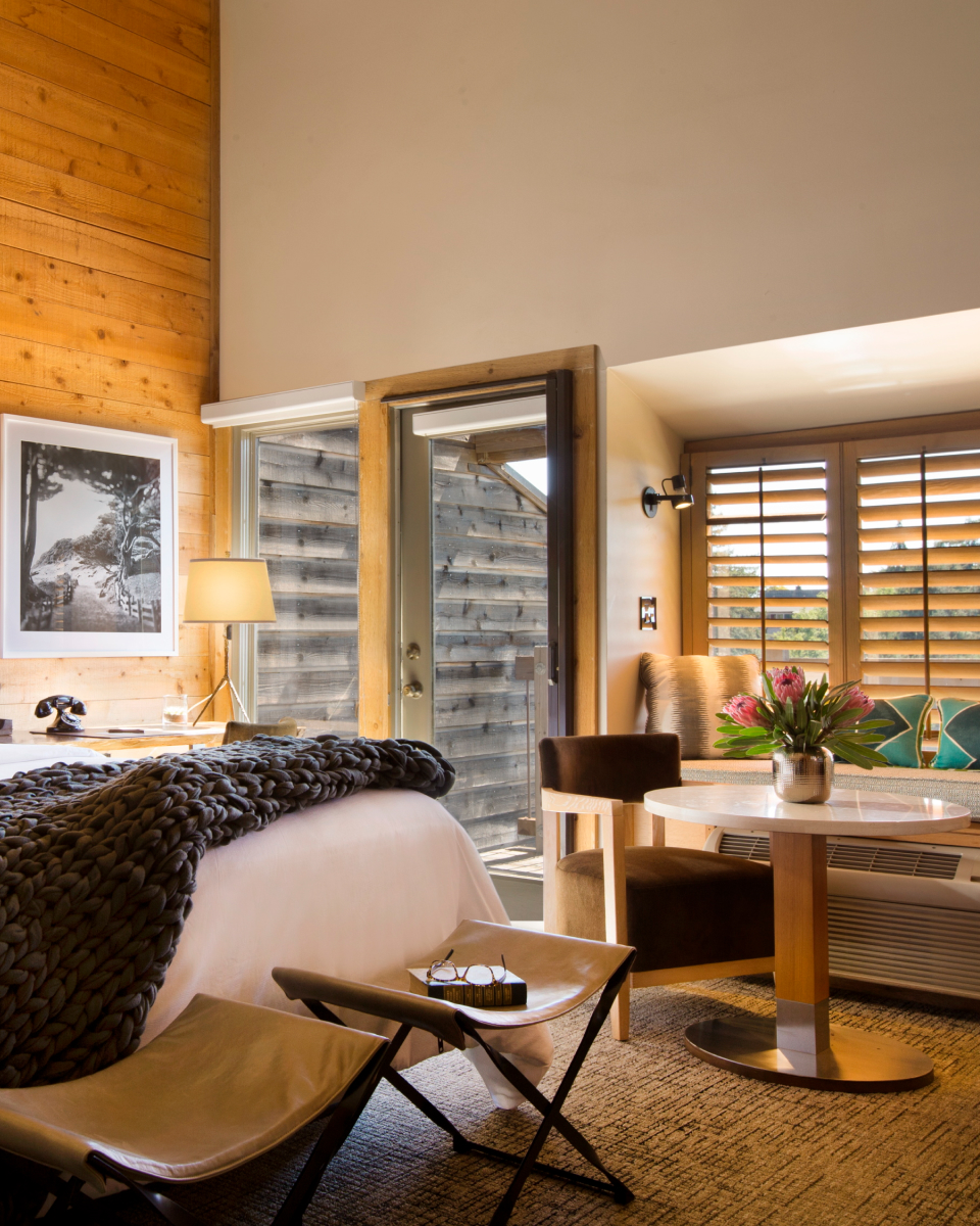 bedroom with wooden wall decor