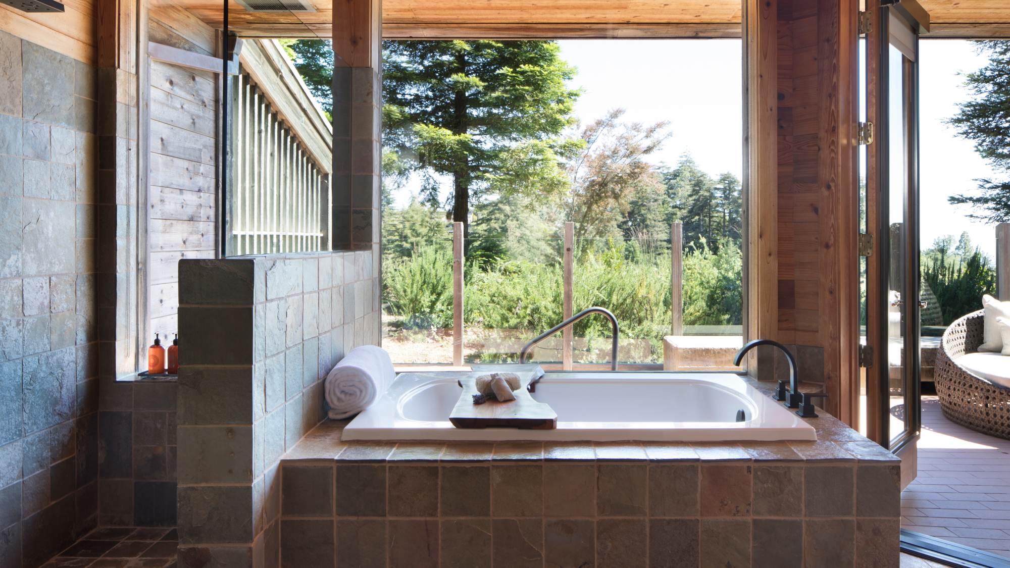 tub with a forest view