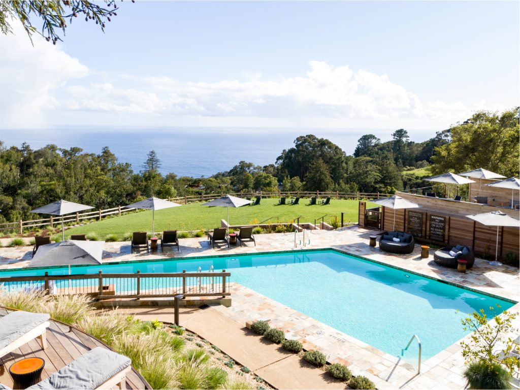 views of the exterior pool and ocean