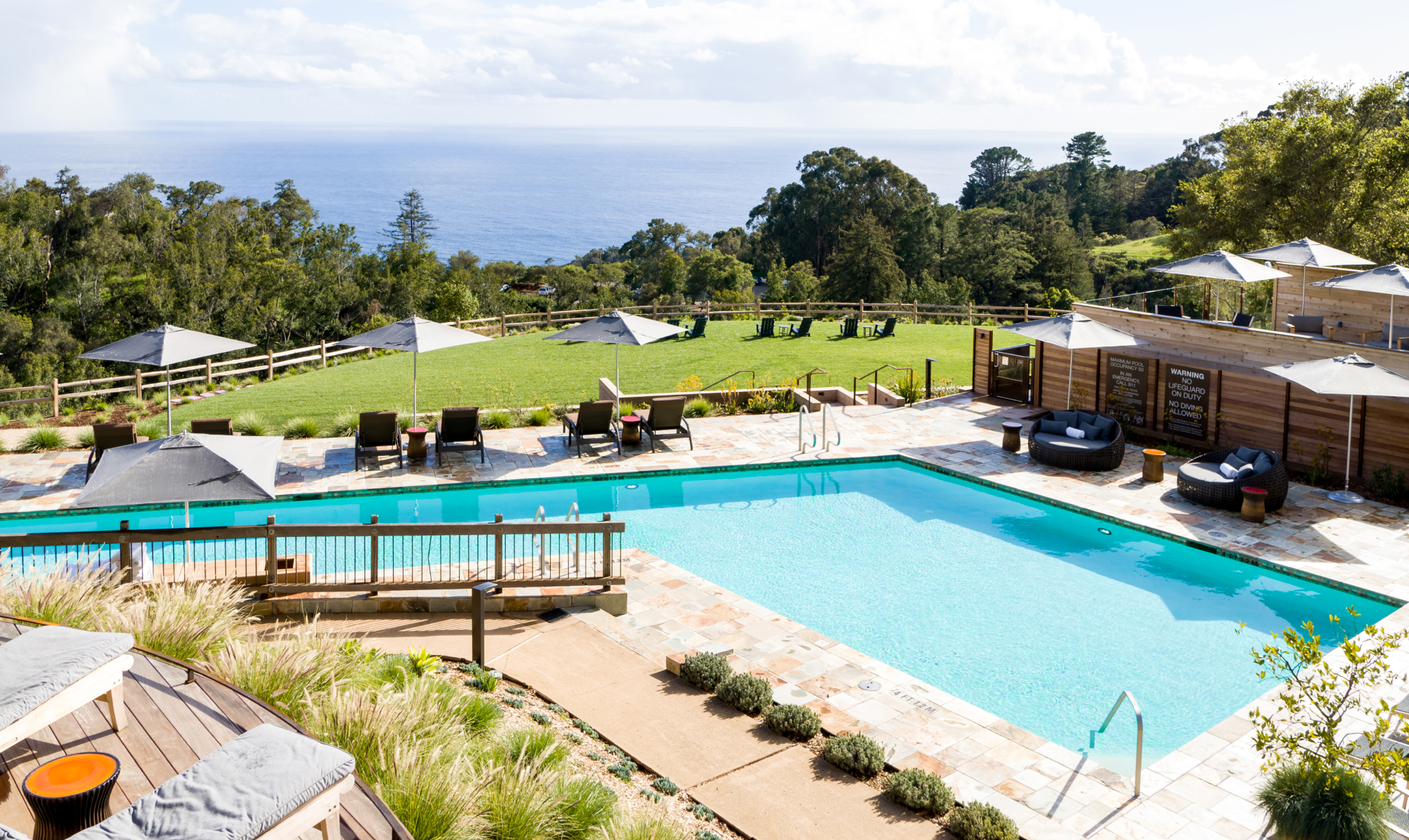 large pool with forest views