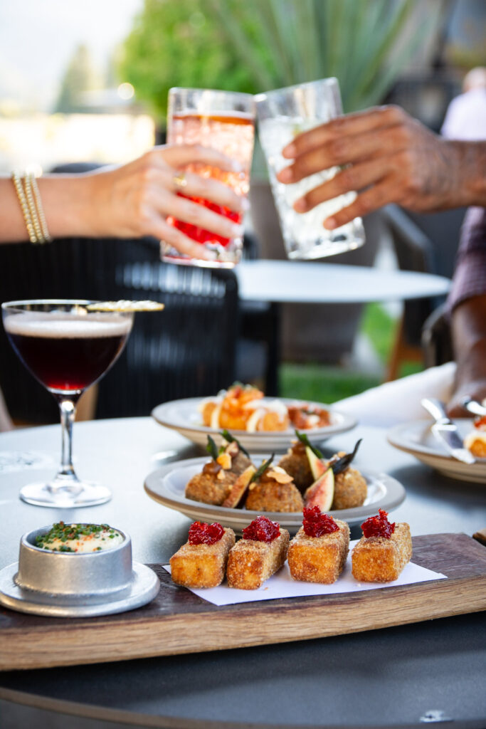 Terrace Bar Couples Hands In Cheers