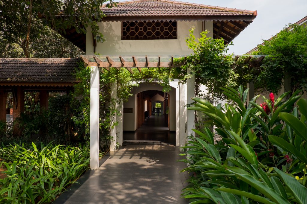 hotel entrance with palm trees