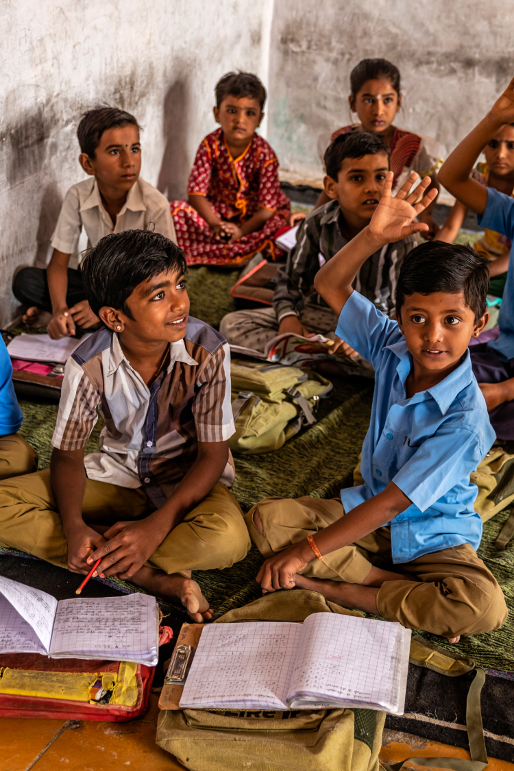 local children in community at a class learning