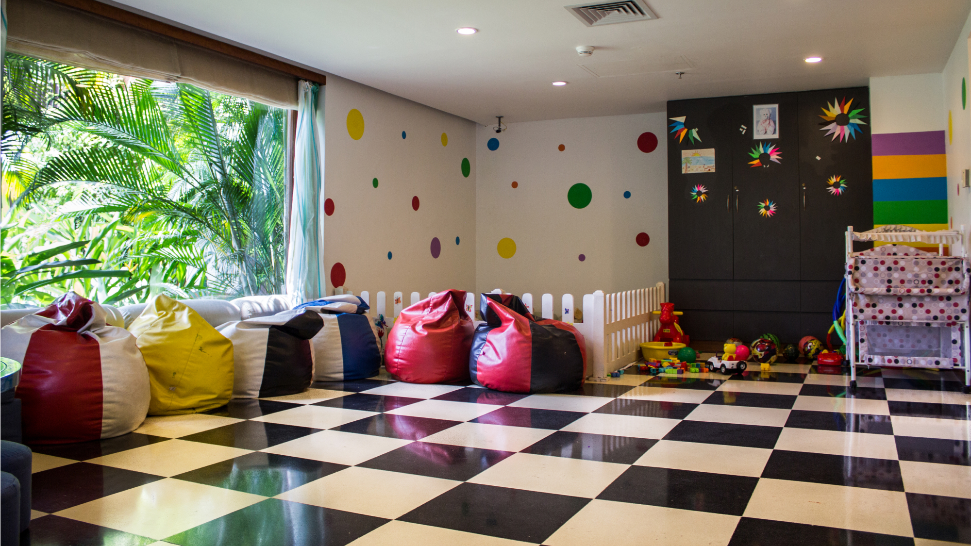 playroom with bean bags and checkered floor