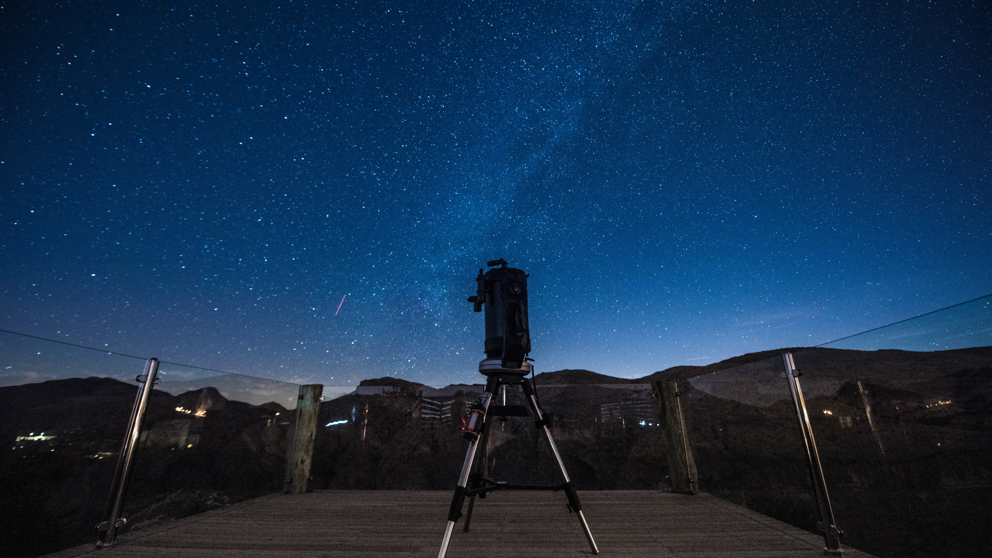 telescope under the stars at night
