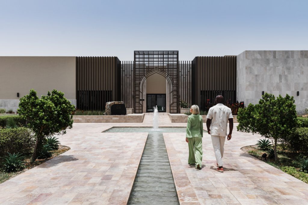 couple walking to resort entrance