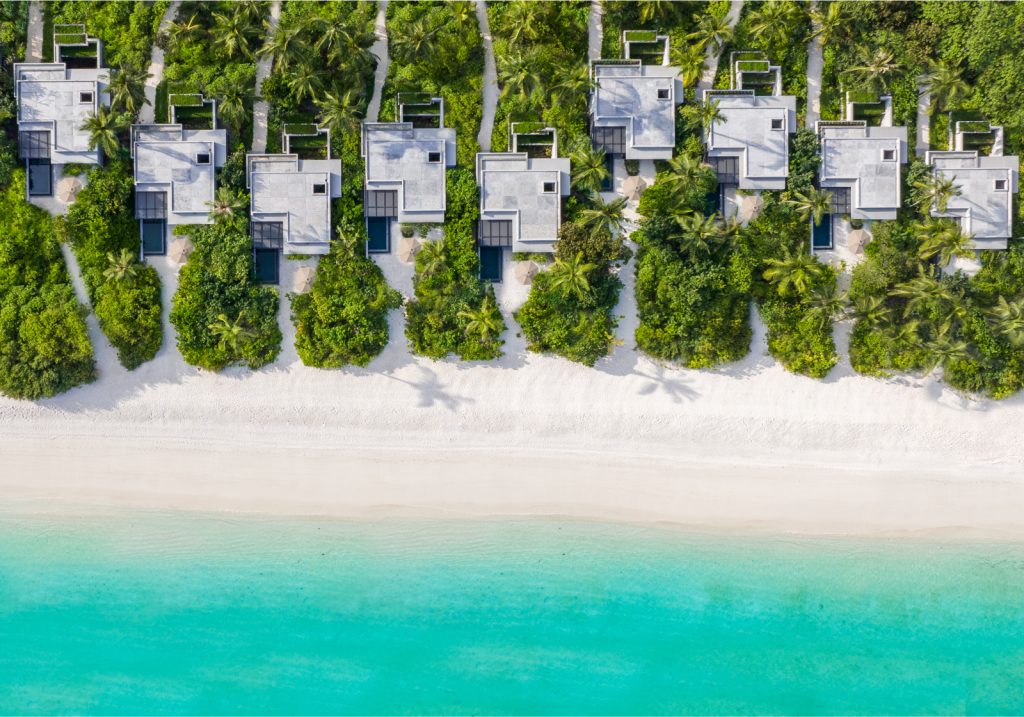 drone view of villas by the beach