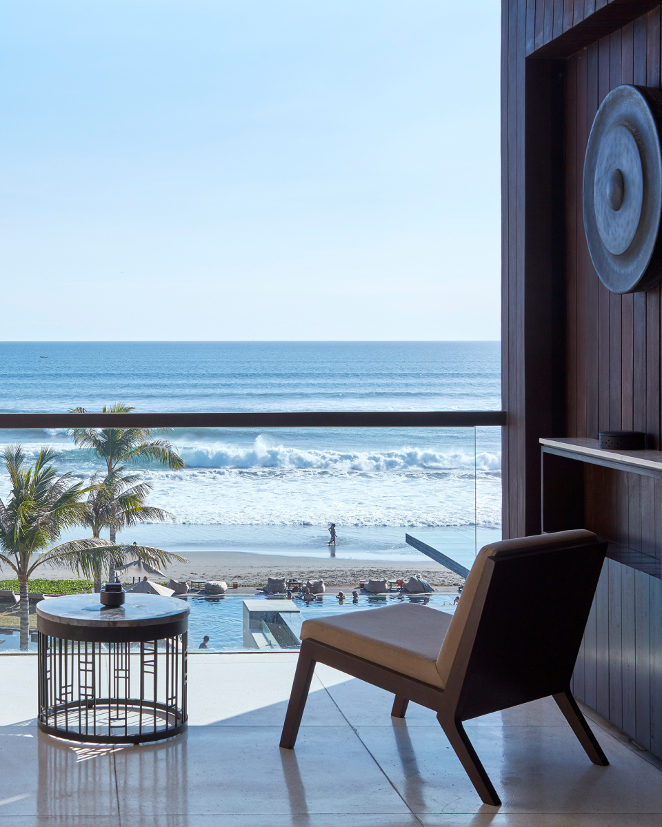 Chair and side table facing the ocean