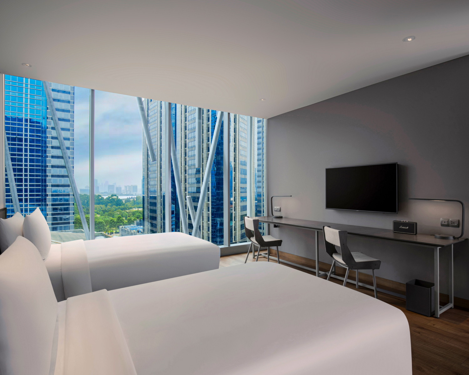 Interior of twin bed studio room with city views