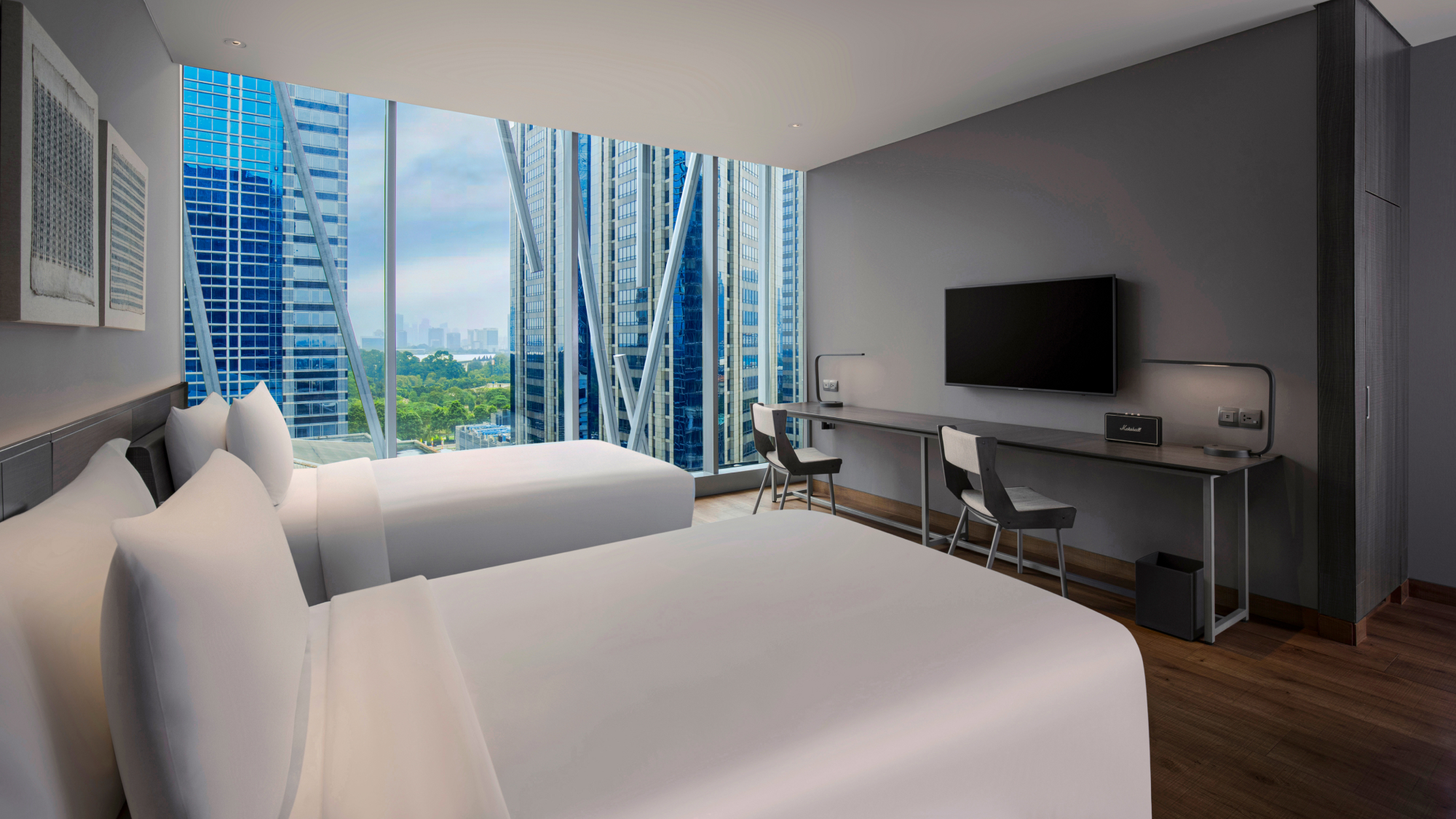 Interior of twin bed studio room with city views